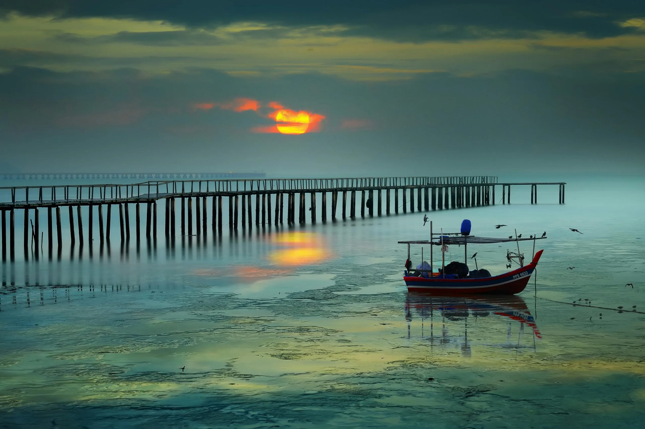 George Town Penang waterfront sunrise reflection Malaysia