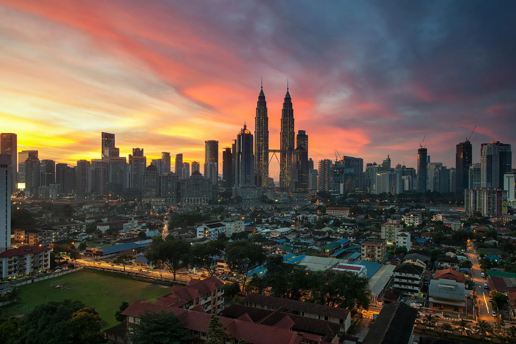 Kuala Lumpur skyline with Petronas Twin Towers at sunset